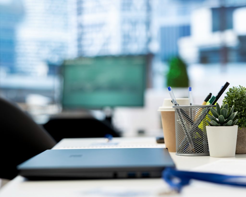 Computer on a desktop in an office.